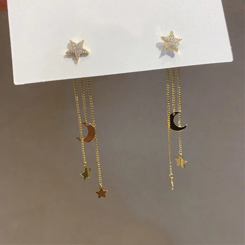 CRYSTAL STAR & MOON DANGLE EARRINGS